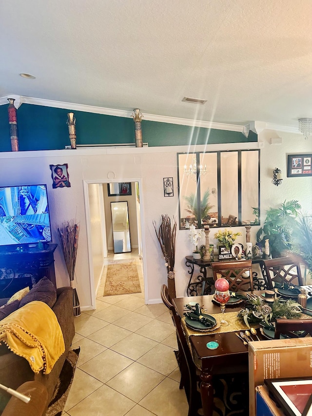 5200 Rising Comet Ln, Greenacres, FL 33463 - dining space featuring ornamental molding, light tile patterned floors, and a textured ceiling