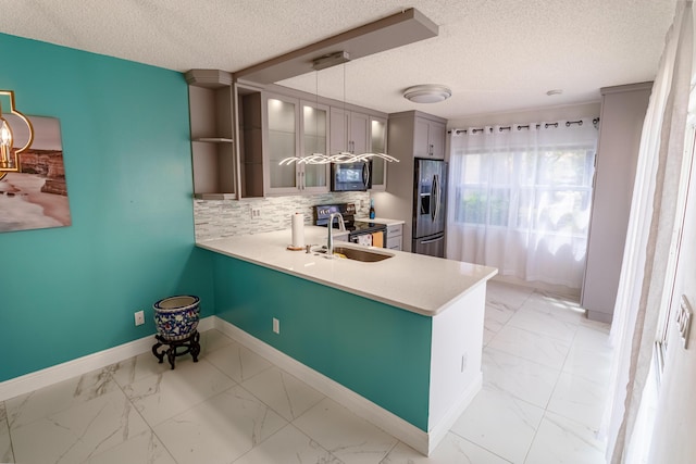 8129 Sedgewick Ct Unit 29-A, Lake Clarke Shores, FL 33406 - kitchen with stainless steel appliances, light marble finish floors, a textured ceiling, tasteful backsplash, and glass insert cabinets