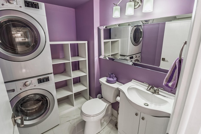 8129 Sedgewick Ct Unit 29-A, Lake Clarke Shores, FL 33406 - bathroom with stacked washer and clothes dryer, marble finish floors, and vanity