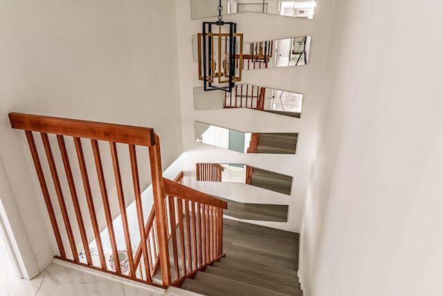 8129 Sedgewick Ct Unit 29-A, Lake Clarke Shores, FL 33406 - stairway with a chandelier
