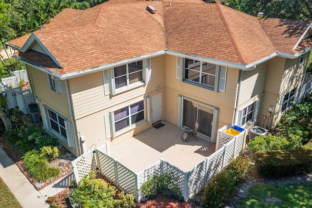 8129 Sedgewick Ct Unit 29-A, Lake Clarke Shores, FL 33406 - back of house featuring a patio, roof with shingles, and stucco siding