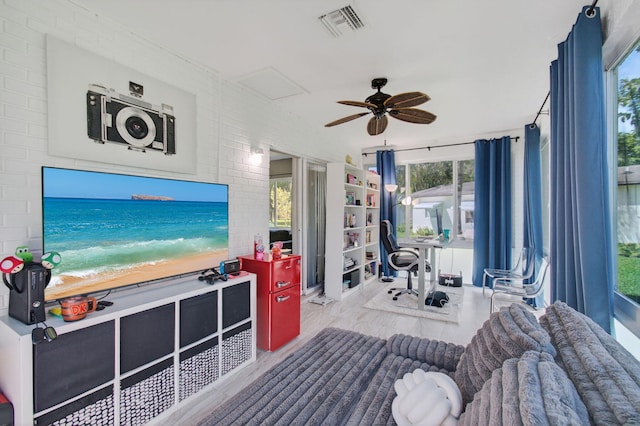 2520 SW Natura Blvd, Deerfield Beach, FL 33441 - living room featuring a ceiling fan