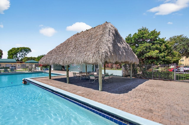 2520 SW Natura Blvd, Deerfield Beach, FL 33441 - community pool with a patio area