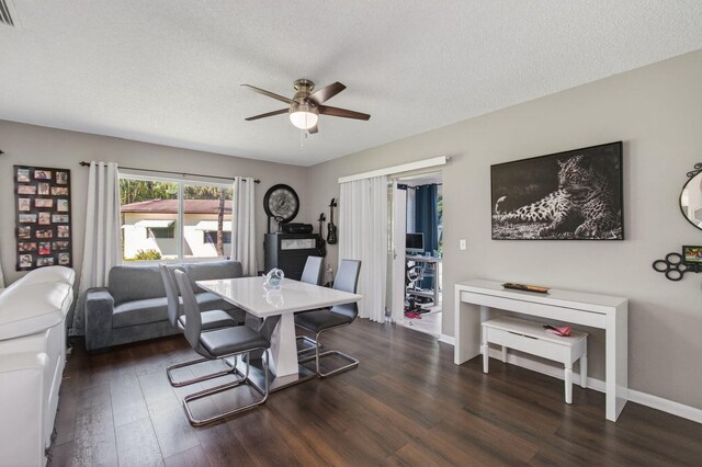 2520 SW Natura Blvd, Deerfield Beach, FL 33441 - dining space with dark wood finished floors, ceiling fan, and a textured ceiling