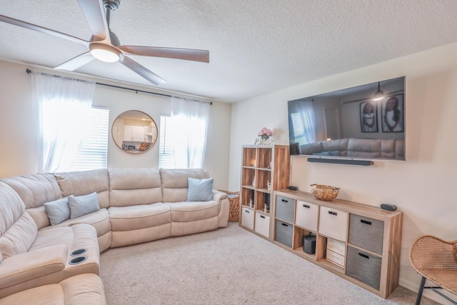 1937 SW Aguero St, Port Saint Lucie, FL 34953 - living area featuring ceiling fan, carpet floors, and a textured ceiling