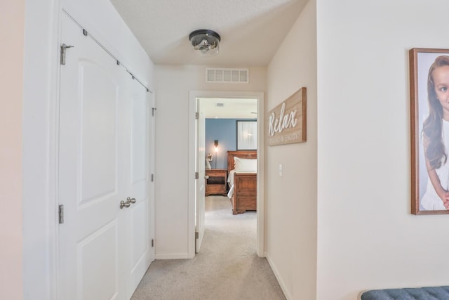 1937 SW Aguero St, Port Saint Lucie, FL 34953 - hall featuring light carpet and baseboards