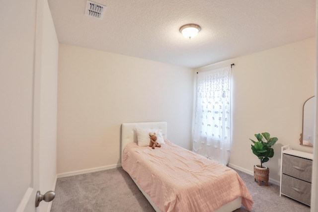 1937 SW Aguero St, Port Saint Lucie, FL 34953 - carpeted bedroom featuring baseboards and a textured ceiling