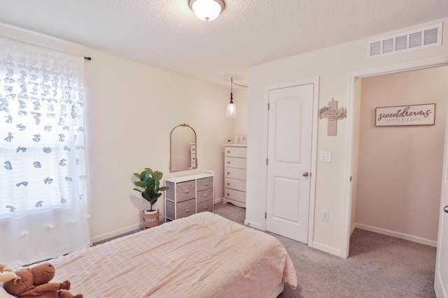 1937 SW Aguero St, Port Saint Lucie, FL 34953 - bedroom featuring multiple windows, light carpet, and a textured ceiling