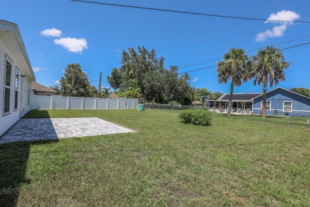 1937 SW Aguero St, Port Saint Lucie, FL 34953 - fenced backyard featuring a patio
