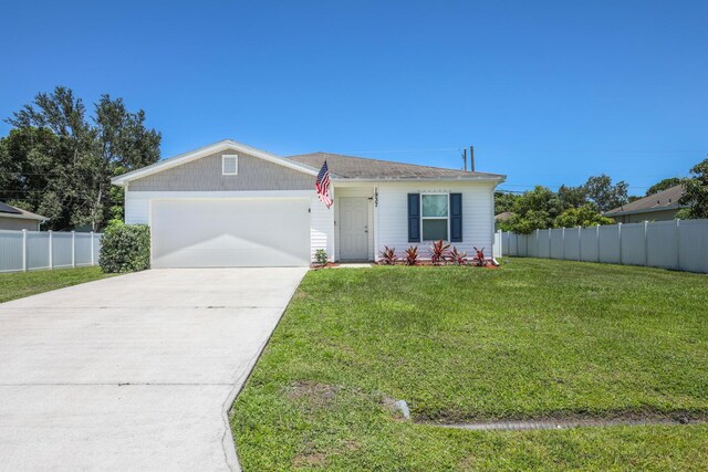 1937 SW Aguero St, Port Saint Lucie, FL 34953 - single story home featuring driveway and a garage