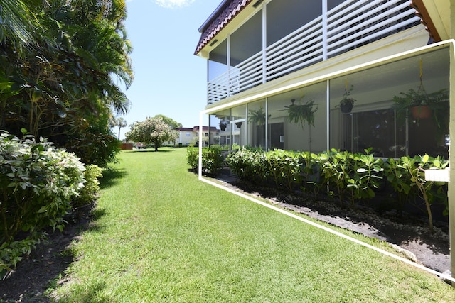 717 S US Highway 1 Unit 108, Jupiter, FL 33477 - view of grassy yard with a balcony