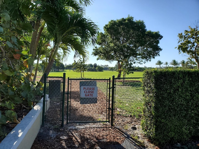 717 S US Highway 1 Unit 108, Jupiter, FL 33477 - gate featuring a view of rural / pastoral area
