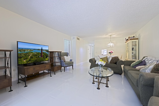 717 S US Highway 1 Unit 108, Jupiter, FL 33477 - living room with a textured ceiling
