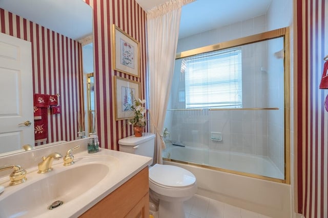 10856 Royal Caribbean Cir, Boynton Beach, FL 33437 - bathroom featuring wallpapered walls, vanity, enclosed tub / shower combo, and tile patterned floors