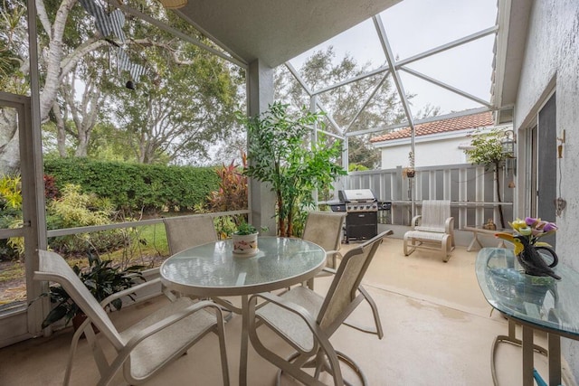 10856 Royal Caribbean Cir, Boynton Beach, FL 33437 - view of patio with outdoor dining area, grilling area, and glass enclosure