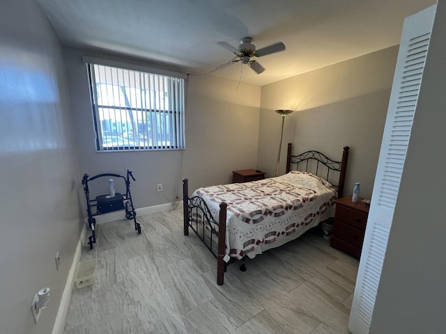 10145 NW 9th St Cir Unit 7-106, Miami, FL 33172 - bedroom featuring ceiling fan and baseboards