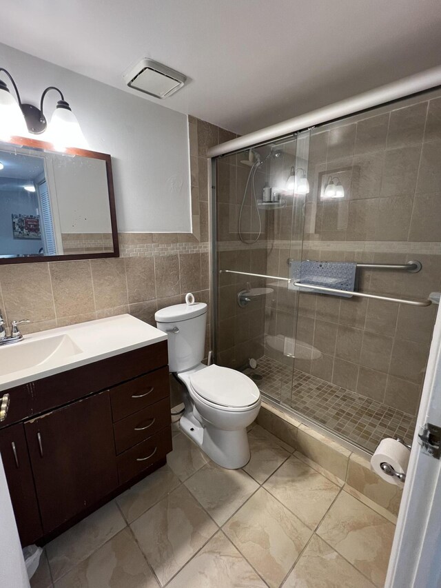 10145 NW 9th St Cir Unit 7-106, Miami, FL 33172 - bathroom with tile walls, vanity, and a stall shower