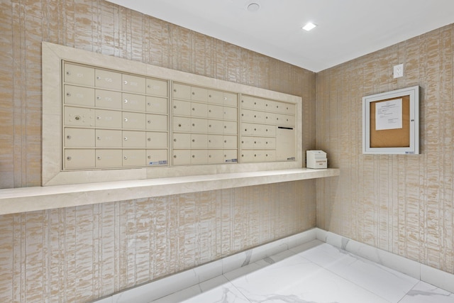3440 S Ocean Blvd Unit 107S, Palm Beach, FL 33480 - view of property's community with mail area and wallpapered walls