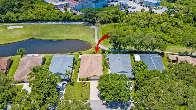 13116 SE Point O Woods Ct, Hobe Sound, FL 33455 - aerial view of residential area featuring a nearby body of water and a golf course