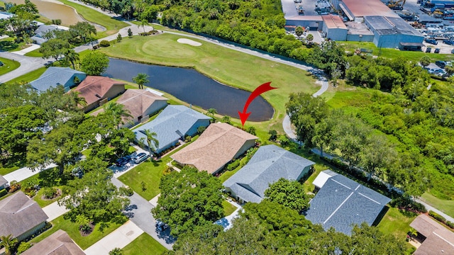 13116 SE Point O Woods Ct, Hobe Sound, FL 33455 - aerial perspective of suburban area featuring a large body of water and a golf club