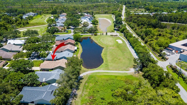 13116 SE Point O Woods Ct, Hobe Sound, FL 33455 - aerial view of property's location featuring nearby suburban area, a large body of water, and a local golf course
