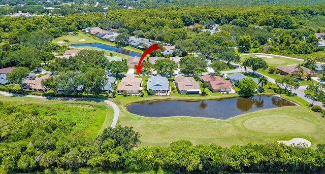 13116 SE Point O Woods Ct, Hobe Sound, FL 33455 - aerial overview of property's location with nearby suburban area, a large body of water, and a golf club