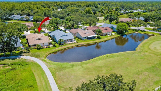 13116 SE Point O Woods Ct, Hobe Sound, FL 33455 - aerial perspective of suburban area featuring a large body of water and a golf course