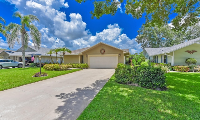 13116 SE Point O Woods Ct, Hobe Sound, FL 33455 - single story home with a garage, driveway, and a front lawn