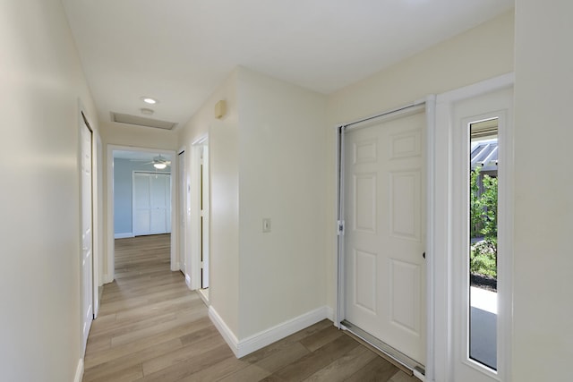 13116 SE Point O Woods Ct, Hobe Sound, FL 33455 - foyer featuring light wood finished floors and recessed lighting