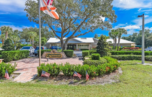 13116 SE Point O Woods Ct, Hobe Sound, FL 33455 - view of home's community featuring a lawn