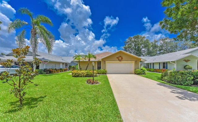 13116 SE Point O Woods Ct, Hobe Sound, FL 33455 - ranch-style house with an attached garage, a front lawn, and driveway