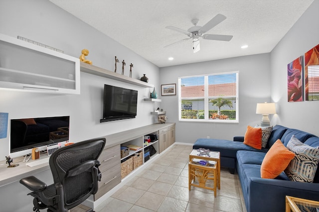 10853 Royal Caribbean Cir, Boynton Beach, FL 33437 - living area featuring a textured ceiling, ceiling fan, light tile patterned floors, built in desk, and recessed lighting