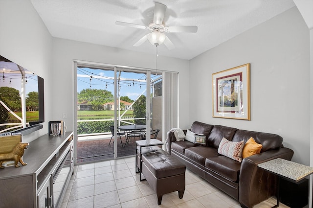 10853 Royal Caribbean Cir, Boynton Beach, FL 33437 - living room with a ceiling fan, light tile patterned flooring, and a sunroom
