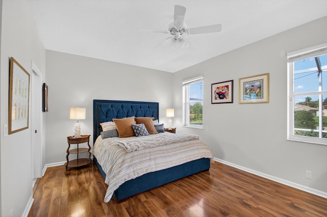 10853 Royal Caribbean Cir, Boynton Beach, FL 33437 - bedroom featuring multiple windows, wood finished floors, and a ceiling fan