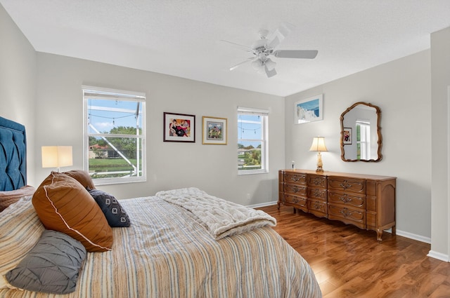 10853 Royal Caribbean Cir, Boynton Beach, FL 33437 - bedroom featuring wood finished floors and ceiling fan