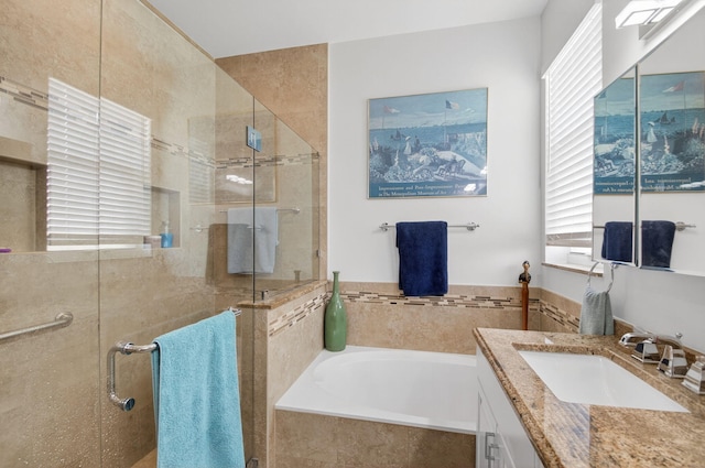 10853 Royal Caribbean Cir, Boynton Beach, FL 33437 - full bath with vanity, a garden tub, and a stall shower