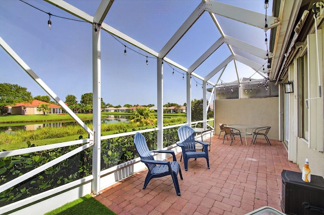 10853 Royal Caribbean Cir, Boynton Beach, FL 33437 - sunroom featuring a water view