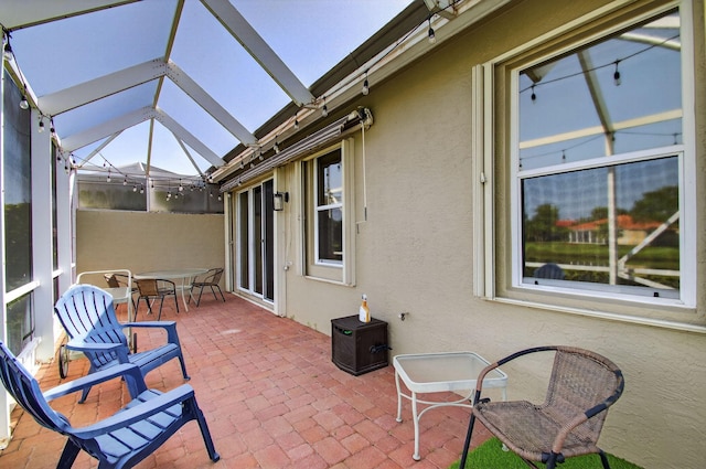 10853 Royal Caribbean Cir, Boynton Beach, FL 33437 - view of patio featuring a lanai and outdoor dining area