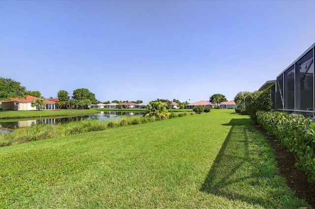 10853 Royal Caribbean Cir, Boynton Beach, FL 33437 - view of green lawn with a water view and a residential view
