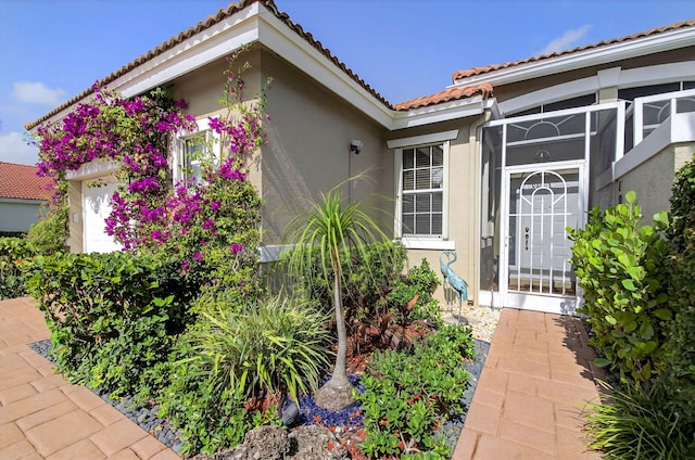 10853 Royal Caribbean Cir, Boynton Beach, FL 33437 - entrance to property featuring stucco siding and a tiled roof