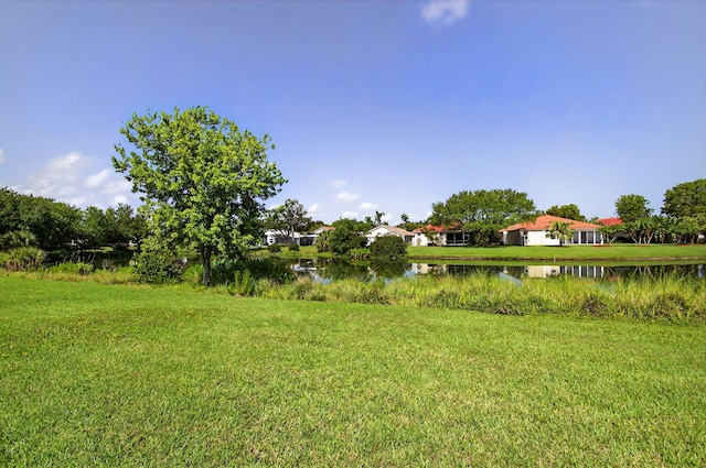 10853 Royal Caribbean Cir, Boynton Beach, FL 33437 - view of green lawn with a water view