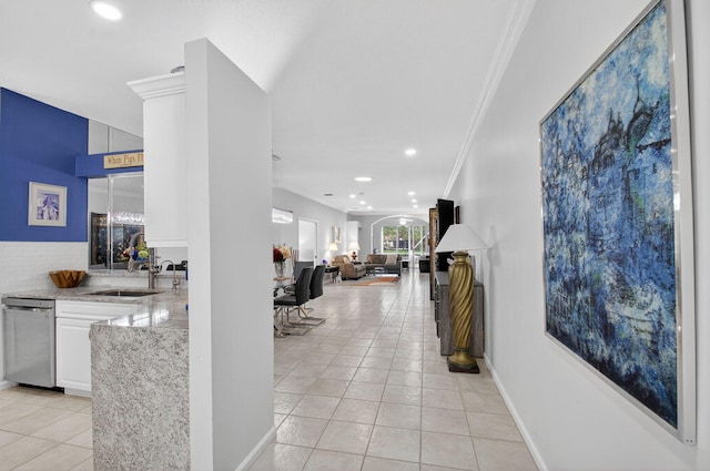 10853 Royal Caribbean Cir, Boynton Beach, FL 33437 - hallway with light tile patterned floors, ornamental molding, and recessed lighting
