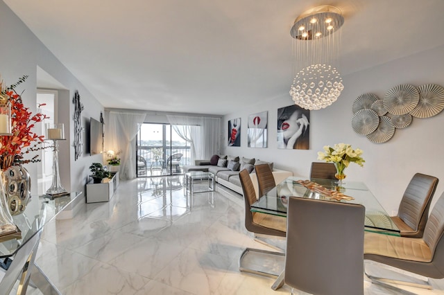 7260 Kinghurst Dr Unit 401, Delray Beach, FL 33446 - dining area featuring a chandelier and marble tiled floors