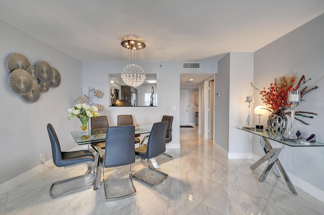 7260 Kinghurst Dr Unit 401, Delray Beach, FL 33446 - dining room featuring marble tiled floors and a chandelier
