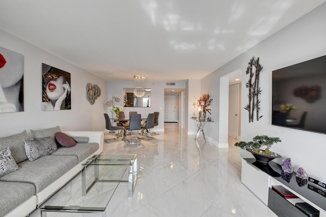 7260 Kinghurst Dr Unit 401, Delray Beach, FL 33446 - living area featuring light marble finish flooring and a chandelier