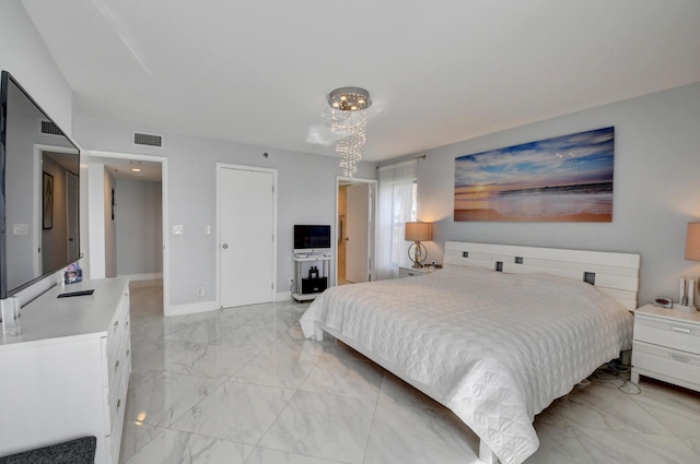 7260 Kinghurst Dr Unit 401, Delray Beach, FL 33446 - bedroom featuring light marble finish flooring and a chandelier