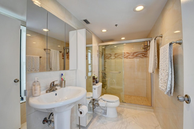 7260 Kinghurst Dr Unit 401, Delray Beach, FL 33446 - bathroom with a shower stall, recessed lighting, tile walls, and marble finish flooring