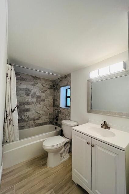 181 NE 15th Ter, Boca Raton, FL 33432 - full bathroom with shower / bath combo, vanity, and wood finished floors