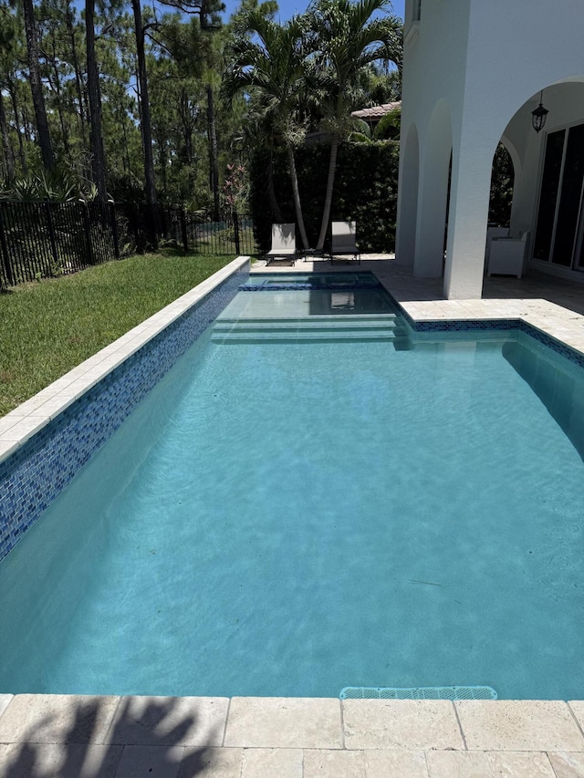 1913 Flower Dr, Palm Beach Gardens, FL 33410 - view of pool with a fenced backyard and a patio area