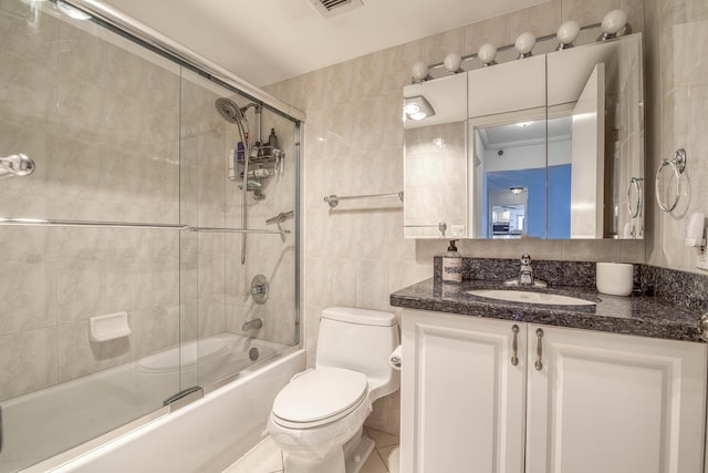 3221 S Ocean Blvd Unit 501, Highland Beach, FL 33487 - full bath featuring tile walls, vanity, and combined bath / shower with glass door